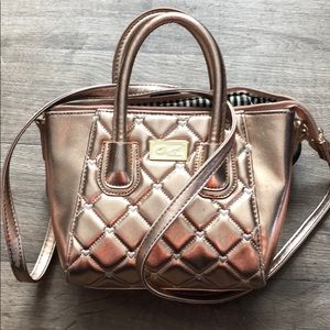 Rose gold Betsy Johnson purse!